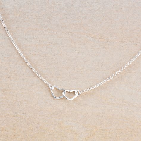 These tiny linked hearts are the happy focus of this dainty necklace! Two sterling silver hearts are hammered and linked together - each heart is about 1/4" wide. Necklace Details all components made of sterling silver choose from 16" and 18" chains hand formed and hammered in Nashville, TN. Tiny Heart Necklace, Silver Jewlery, Silver Necklace Simple, Hammered Jewelry, Pretty Jewelry Necklaces, Hearts Necklace, Necklace For Girlfriend, Jewelry Accessories Ideas, Silver Jewelry Necklace