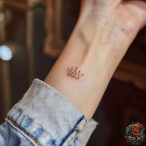 Unveiling the Symbolism: Exploring the Intricate Meanings of a Queen’s Crown Tattoo: 118 Designs - inktat2.com Dainty Tiara Tattoo, Mini Crown Tattoo, Little Crown Tattoo, Flower Crown Tattoo, Crown Tattoo On Wrist, Princess Crown Tattoo, Princess Crown Tattoos, Poem Tattoo, Tiara Tattoo