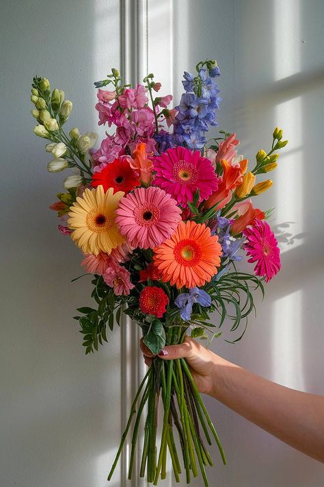 A gerbera bridal bouquet with pink, orange, and yellow blooms. Flower Bouquet No Roses, Flowers That Go Together Bouquet, Colorful Daisy Bouquet, Wedding Bouquets Bright Colors, Orange Gerbera Bouquet, Assorted Flower Bouquet, Wedding Flowers Bright Colors, Bouquet Of Flowers Colorful, Gerbera Daisy Bouquet Wedding