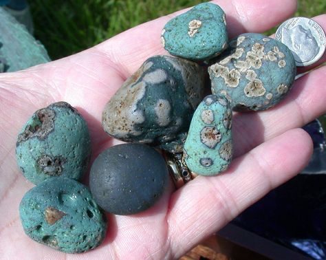 150 year Lake Michigan beach-tumbled slag glass specimens.  Created during the iron smelting / purification process of the mid 19th century. The main impurity in the raw iron was silica (glass). The iron was melted using the intense heat of a hardwood fired blast furnace. The slag floated to the top and was skimmed off and discarded in the big lake. It has tumbled in the waves for over a century. Petosky Stone, Lake Michigan Stones, Leland Blue Stone, Michigan Rocks, Blast Furnace, Rock Tumbling, Rocks And Fossils, Rock Hunting, Big Lake