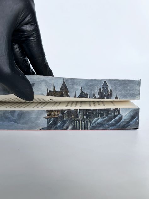 Harry Potter and the deathly hallows | Hogwarts final battle scene | Painting | Fore-edge painting | Dementors | Voldemerot | Watercolor painting | Fantasy books | Books aesthetic | Bookworm gift idea | Reader gift idea | Unique gift idea | Painted edges Foredge Painting, Book Edge Painting, Book Paintings, Wizard Book, Book Edges, Book Painting, Battle Scene, Scene Painting, The Deathly Hallows