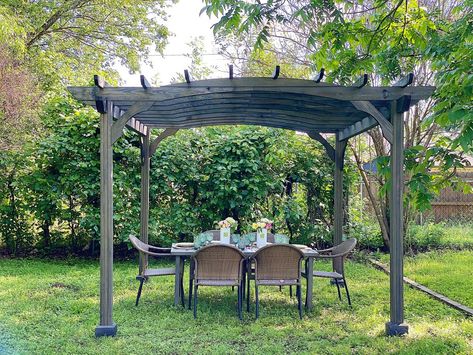 I am so happy to share our new Outdoor Dining area at our Waco Airbnb. I wanted to create an additional outdoor dining area and thanks to Bed Bath and Beyond, this area under the pergola is just incredible. Pergola Patio Decor Ideas, Covered Patio Decorating Ideas, Backyard Patio Pergola, Covered Patio Decor, Patio Pergola Ideas, Gazebo Decorating Ideas, Pergola Outdoor, 100 Year Old Home, Wood Pergola