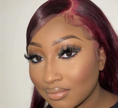 Glittery Makeup Looks Black Women, Rhinestone Makeup Looks Black Women, Red Rhinestone Makeup, Makeup Look For Black Women, Rhinestone Eye Makeup, Makeup Looks For Black Women, Wet Makeup, Brown Makeup Looks, Red Makeup Looks