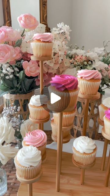 Ashley Temple on Instagram: "Comment CUPCAKE and I’ll send you the info for this stand and all my hostess items! 

create a cupcake bar so easily with some store-bought cupcakes that match your parties theme and this stand makes it quite effortless !

#partyideas #graduationparty #bridalshower #babyshower #amazonfinds #partycakes #partystylist #cupcakeart #cupcakesofinstagram #dessertbar"