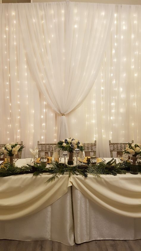 Winter Wedding Head Table decorated with pin. Winter Wedding Head Table Backdrop, Head Table Winter Wedding, Wedding Reception Head Table Backdrop, Winter Wedding Head Table, Silver Anniversary Decorations, Wedding Backdrop Head Table, Bridal Table Backdrop, Head Table Wedding Backdrop, Main Table Wedding