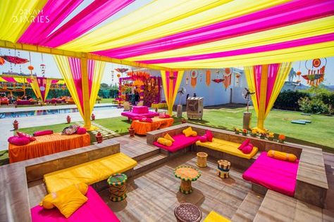 Photo of Pink and yellow themed mehendi decor. Pink Indian Wedding, Haldi Ceremony Decorations, Haldi Decor, Mehendi Decor, Birthday Party Venues, Wedding Hall Decorations, Flower Garland Wedding, Wedding Decor Photos, Marriage Decoration