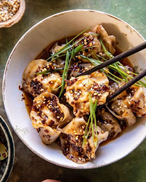 Sesame Ginger Dumplings in Chili Oil. with 2 fillings because I was indecisive and both sound too good…sweet-spicy ginger roasted squash and sesame ginger chicken. warming and perfect for the cooler nights. the dumplings are little sweet, but the spicy oil balances it. it’s SO GOOD. a little soy sauce on top seals the deal. recipe in profile. love a little take style dinner at home. Tieghan Gerard, Homemade Egg Rolls, Half Baked Harvest Recipes, Homemade Dumplings, Sesame Ginger, Light Meals, Harvest Recipes, Roasted Squash, Half Baked