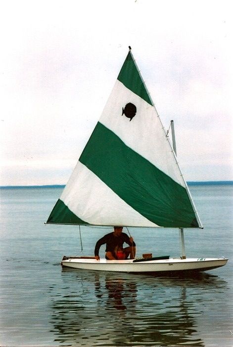 This is an AquaFin - one of my favorite one-person boats to sail! Sail Boat, Boat Plans, Set Sail, Ponds, Yachts, Green And White, East Coast, In The Middle, The Great Outdoors