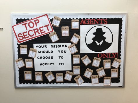 Mission Impossible Bulletin Board with student written goals to begin the school year. Top Secret Bulletin Board, Mission Possible Bulletin Board, Mission Impossible Bulletin Board Ideas, Secret Agent Bulletin Board, Spy Bulletin Board Ideas, Mission Impossible Theme Decorations, Mission Impossible Party Decorations, Mission Impossible Crafts, Connect Four Bulletin Board