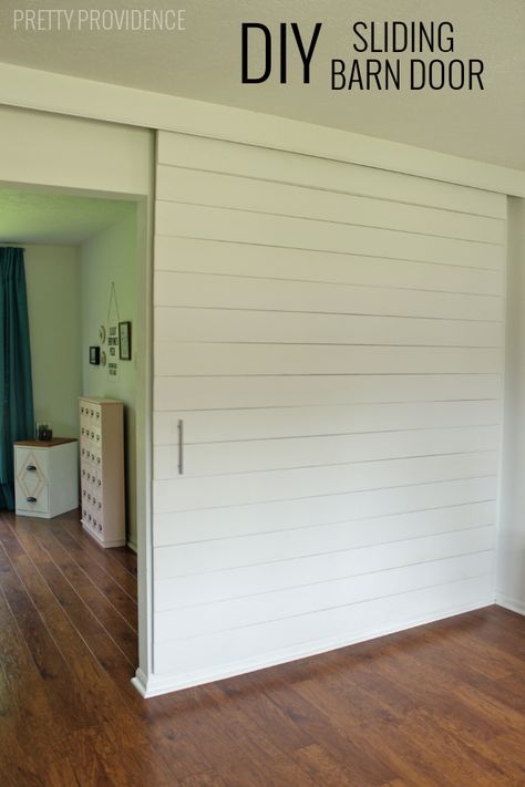 build an extra large sliding barn door with hidden hardware to close off an office - Pretty Providence Door Hardware Ideas, Barn Door Projects, Hardware Ideas, Diy Sliding Barn Door, Diy Room Divider, Diy Barn, Room Divider Doors, Dekor Diy, Rolling Door