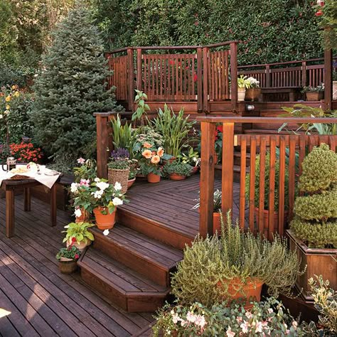 Deck the Hill-This is perfect for a backyard with a slope! Love it! Reling Design, Rustic Pergola, Deck Railing Design, Garden Problems, Sloped Yard, Sloped Backyard, Wooden Deck, Sloped Garden, Diy Pergola