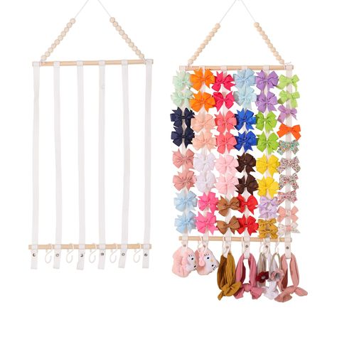 PRICES MAY VARY. Large Capacity(without hair bows):1pc hairbow holder with 6 sturdy and soft cotton belt,2 bigger wooden stick,1 seamless hook and 5 S-shaped hooks.The girls bow organizer a pprox 15〞length and 35〞height.S hook approx 2.3〞length.The girl bow organizer can holder up 100 hair bows or 100 hair clips and 20 headbands.This bow hanger for girls hair bows can accommodate you growing bow and hair accessories collection. High Quality Material:The hair bow organizer has added a new design Girl Bow Organizer, Baby Headband Holder, Baby Headband Holders, Hair Bow Storage, Hair Bow Display, Headband Storage, Bow Storage, Bow Display, Hair Bow Organizer