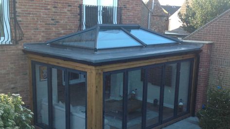 Flat roof extensions don't have to be large. They can be small but still include a lantern roof and spans of bi-fold doors. Flat Roof Lantern Extension, Flat Roof With Lantern, Small Flat Roof Extension, Small Dining Room Extension, Flat Roof Extension With Lantern, Small Flat Roof Extension Ideas, Lantern Roof, Roof Lantern Extension, Flat Roof Conservatory