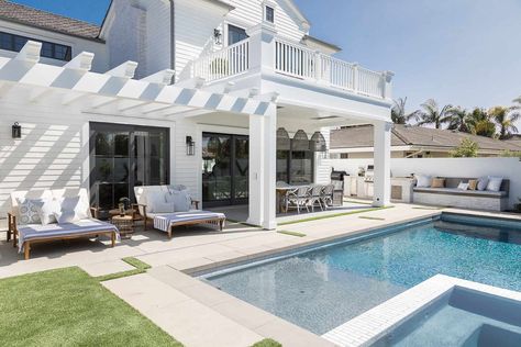 Brandon Architects has designed this sprawling two-story home inspired by a ‘Pennsylvania Dutch’ architectural style, located in Newport Beach, California. Mindy Gayer Design, Dutch Style, Beautiful California, Pool Lounger, Studio Interior Design, Backyard Pool Landscaping, Pennsylvania Dutch, Backyard Spaces, Studio Interior