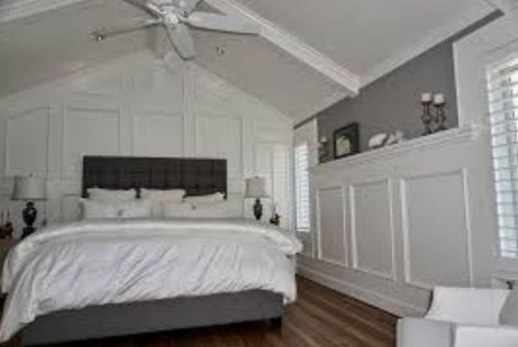 Room With Slanted Ceiling, Bedroom Wainscoting, Wainscoting Wall, Wainscoting Bedroom, Vaulted Ceiling Living Room, Bedroom With Sitting Area, Bedroom Orange, Accent Wall Bedroom, Traditional Bedroom