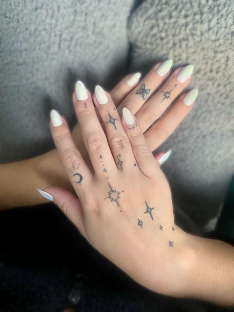 #nails #tattoo #tattooideas #tattooart #tinytattoo #tinytattoosideas #tattoosforwomen #handtattoo #fineline #butterflytattoo #finelinetattoo #moontattoo Moon Hand Tattoos For Women, Crescent Moon Finger Tattoo, Fineline Hand Tattoo, Sun And Moon Hand Tattoo, Sun Finger Tattoo, Tiny Fish Tattoo, Fine Line Hand Tattoo, Tattoo Claims, Baddie Tats