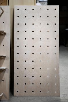 An Easy-ish DIY: Oversize Plywood Pegboard with Shelves - The Organized Home Pegboard Entryway, Peg Board Diy, Pegboard Headboard, Plywood Pegboard, Diy Peg Board, Large Pegboard, Peg Board Walls, Wooden Pegboard, Peg Wall