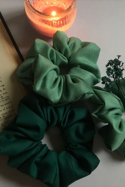 these are green scrunchies are part of my first ever scrunchies i made. They came out so great and pretty. i love them!!!!!😍😍 Green Scrunchie Aesthetic, Green Scrunchie, Shades Of Green, Scrunchies, I Love, Hair Styles, Green, Hair, Quick Saves