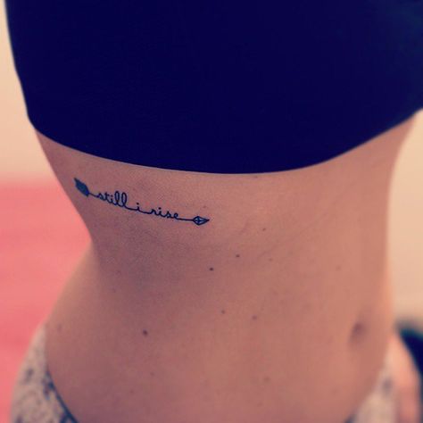 Still I Rise Tattoo, Rib Tattoos Words, Tattoo Arrow, Wörter Tattoos, Tattoos On Side Ribs, Small Arrow Tattoos, Still I Rise, Disney Tattoo, Arrow Tattoo