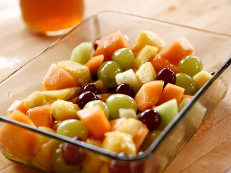 Fruit Salad with Spiced Honey and Thyme recipe from Ree Drummond via Food Network Food Network Recipes Pioneer Woman, Ree Drummond Recipes, Pizza Sugar Cookie, Spiced Honey, Thyme Recipes, Soup Appetizers, Fresh Fruit Salad, Chips Ahoy, Pioneer Woman Recipes