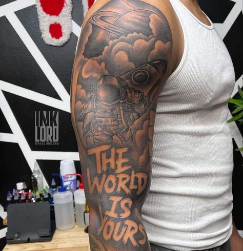 Hood Cartoon Tattoos, Top Of The Arm Tattoo Men, Upper Tattoos Arm, Skys The Limit Tattoo Men, One Of One Tattoo Men, Muscle Tattoos Women, Black Man Tattoo Sleeve, Sholdertatoos Men, Sky’s The Limit Tattoo