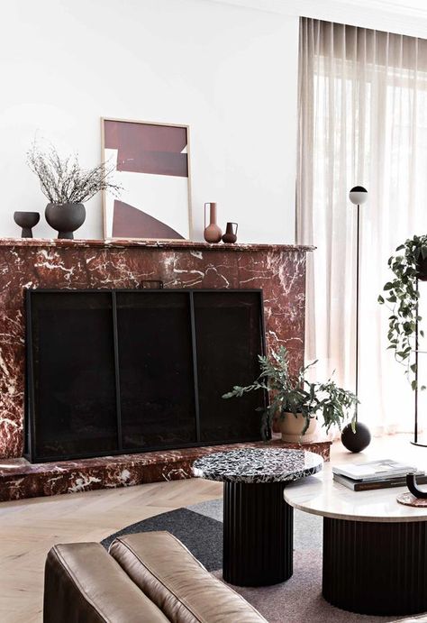 While some homeowners leap at the chance to replace their old fireplace, a Melbourne family had other ideas. Brick House Renovation, Childrens Bathroom, Tudor Revival, Old Fireplace, Marble Fireplace, Red Marble, Apartment Renovation, Timeless Aesthetic, Living Room Decor Cozy