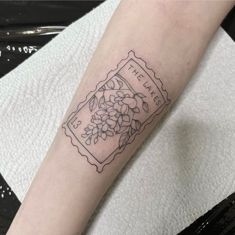 Take Me To The Lakes Tattoo, Folklore Tattoo Ideas Taylor Swift, Stamp Tattoo Taylor Swift, Evermore Taylor Swift Tattoo Ideas, Taylor Swift 13 Tattoo Ideas, Taylor Swift Tattoo The Lakes, Taylor Swift Tattoo Ideas Small Red, Taylor Swift Flowers Tattoo, Taylor Swift Tattoo Fine Line