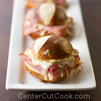 If you have leftover ham from Easter dinner, you should try these delicious ham and cheese sandwiches with gruyere and swiss cheese on pretzel rolls! Breakfast Sandwich Sauce, Sandwich Sauce, Pretzel Roll, Pizza Bagel, Ham Rolls, Ham And Cheese Pinwheels, Pretzel Bread, Ham And Swiss, Sandwich Sauces