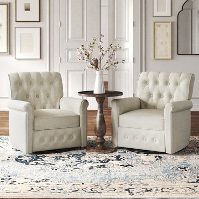 This pair of armchairs are just right for creating a warm, homey vibe in your living room or den. What’s more, they boast notable features, such as swivel and recline options, so you’re able to get comfortable whether you’re watching a movie or reading a book. Their frames are made from kiln-dried engineered wood and metal with sinuous springs construction for support. The rolled arms, tufted back, and plump seat are foam wrapped in easy-care polyester. Position side-by-side with an accent table Traditional Sitting Room Decor, Tufted Swivel Chair, Side Tables For Swivel Chairs, Couch With Two Chairs Layout, Living Room Sitting Area Ideas, Reading Area In Living Room, Fireplace Seating Ideas, Swivel Chairs Living Room, Small Sitting Room Ideas