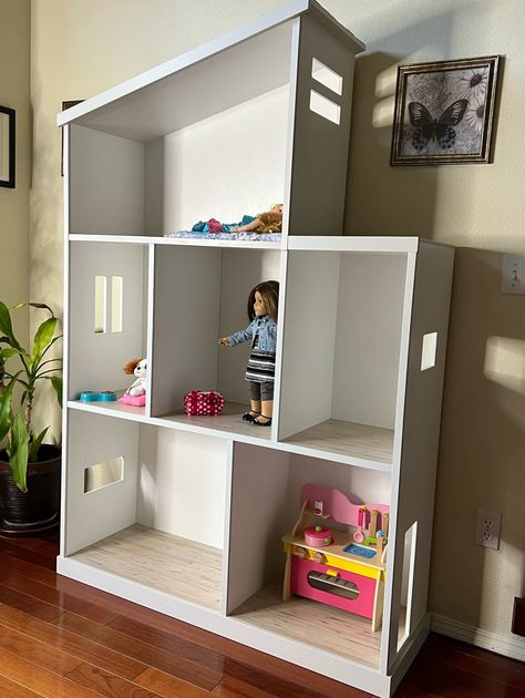 "Large Dollhouse for American Girl dolls. Hand-made of painted, premium, cabinet grade 1/2\" hardwood plywood with hardwood base and front  trim in color of your choice. 22\" ceiling height on the first two levels to accommodate popular furniture and accessories for American Girl, Our Generation, and other 18\" dolls. (1:4.5 scale) Overall dimensions: 48\" x 15\" x 72\"H This item is made to order and shipped fully assembled by motor freight. Available with optional Cedar Shake roof shown and/or Our Generation Doll House Diy, Our Generation Doll Accessories Diy, My Generation Doll Storage, American Girl Doll Storage Ideas, Diy Our Generation Doll House, American Girl Doll Organization, American Girl Organization, American Girl Storage Ideas, American Doll Storage Ideas