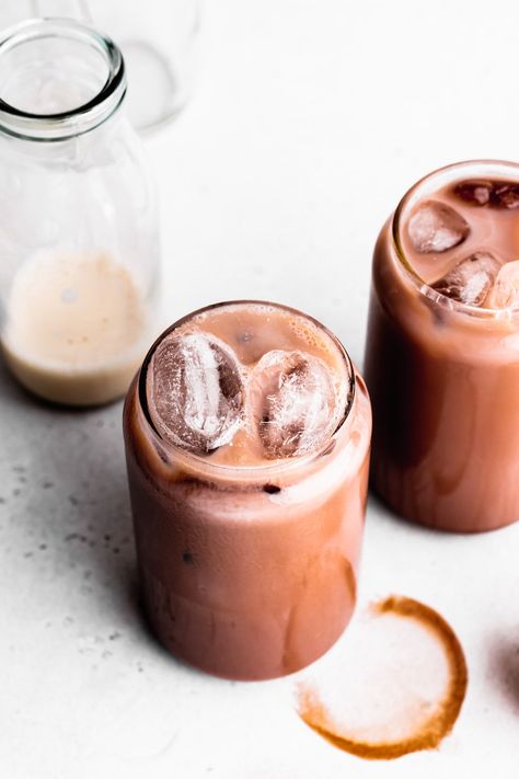 This recipe turns a few simple ingredients into a delicate cold chocolate drink. Iced chocolate is easy to make with all the boosting flavors of a warm chocolate drink in a cold drink. Easy, delicious, and vegan. www.thegreencreator.com - #thegreencreator #vegan #plantbased #icedchocolate #veganchocolatemilk #chocolatemilk #chocolademelk #coldchocolatemilk #veganchocolate #iceddrink Iced Chocolate Drink Recipe, Iced Cacao Drink, Chocolate Milk Recipe, Ice Chocolate Drink, Cacao Powder Recipe, Cold Weather Drinks, Cold Chocolate, Iced Chocolate, Cold Drinks Recipes