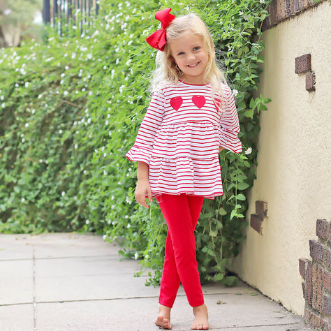 This adorable Sweet Valentine Callie Legging Set is the perfect choice for a Valentine's Day school party. The red stripe knit top features heart appliqués and 3/4 sleeves with red trim. The set includes red leggings. Ideal for playtime fun, comfort, and cuteness! outfit | kids closet | trending | kids fashion trends | fall fashion | fall 2023 | smocked clothes | kids smocked clothes fall | what to wear | closet for kids Kids Smock, Heart Applique, Smocked Clothes, Kids Closet, Clothes Fall, Kids Fashion Trends, Red Leggings, School Party, Valentines Outfits