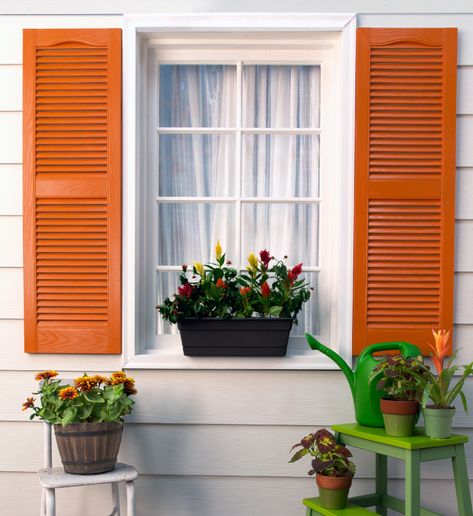 Gray Cottage Exterior, Nocturne Shade, Orange Shutters, Light Blue House Exterior, Gray Cottage, Outdoor Porches, Color Spotlight, Orange Paint Colors, Basement Paint Colors