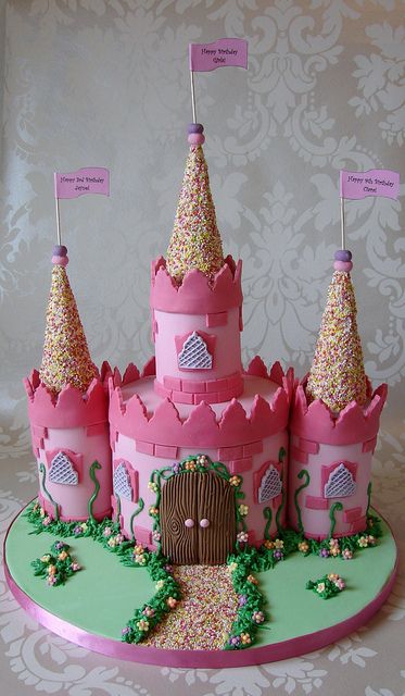 im thinking this style of cake for ellie, but decorated with candy. Have the main frame pink lemonade cake, the towers out of rice kripsy treats, with a gumdrop path. The tower roof will be an ice cream cone covered in frosting and rolled in sprinkles. Other candy: twizzlers, lots of pink candy Castle Birthday Cakes, Princess Castle Cake, Birthday Cake Pictures, Pink Castle, Castle Cake, Princess Castle, Cake Pictures, Princess Cake, Girl Cake