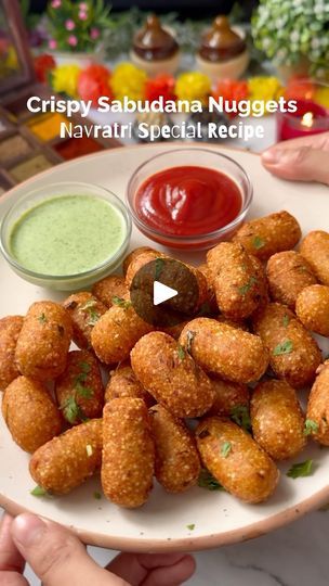 1.8M views · 85K reactions | Crispy Sabudana Nuggets | Navratri Special Recipe

Navratri is observed to honor Goddess Durga or Ambe Maa, and is one of the most cherished Hindu festivals.

I have used the Deep Tri-Ply Kadai from @bergnerindia and upgraded my kitchen with high-quality stainless steel cookware. 

Ingredients 
Boiled Potatoes - 4
Sabudana - 1 cup
Roasted Peanuts - 1/3 cup
Sugar - 1 tsp
Salt - 1 tsp
Cumin Seeds - 2 tsp
Green Chilies - 3
Grated Ginger - 1 tsp
Lemon Juice - 1 tsp
Coriander - 1 tbsp

#Bergner #BergnerIndia #yum #navratri  #healthy #food #festival #foodblogger #food #foodie #healthyfood #foodpics #yumm #yummy #delicious #cooking #trending #viralreels #viral #foodlover #instafood #foodism #yummyfood #yummyyummy #réel #lunchbox #breakfast #reelsinstagram #appe #yummy Navratri Special Food Recipes, Navratri Recipes, Ambe Maa, Goddess Durga, Cumin Seeds, Gujarati Recipes, Navratri Special, Hindu Festivals, Boiled Potatoes