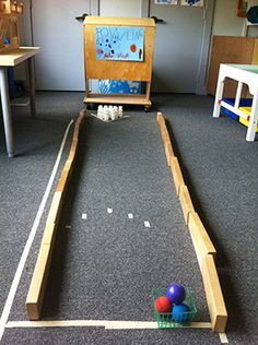 Bowling Alley in a Preschool Classroom. Could use… Sports Day Eyfs, Sports Eyfs Activities, Ball Study Dramatic Play, Balls Study Creative Curriculum Dramatic Play, Exercise Creative Curriculum Preschool, Ball Unit Creative Curriculum, Creative Curriculum Exercise Study, Ball Study Creative Curriculum, Pvc Pipe Connectors