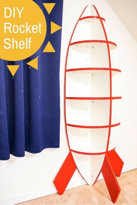 This rocket bookshelf is perfect for a space themed bedroom! Easy to make with just one sheet of plywood. Get the free woodworking plans and tutorial at The Handyman's Daughter! | rocket shelves | spaceship shelves | spaceship bookshelf | kids room idea | Rocket Bookshelf, Bookshelf Kids Room, Bedroom Bookshelf, Space Kids Room, Kids Room Bookshelves, Do It Yourself Decoration, Woodworking Plans Patterns, Popular Woodworking Projects, Diy Rocket