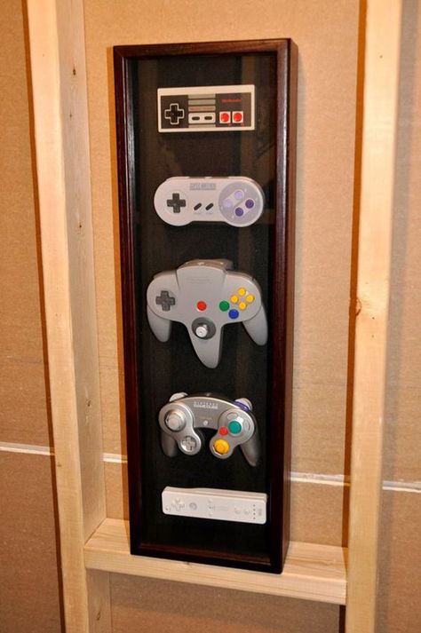 15 Cool Ways To Video Game Controller Storage | Home Design And Interior Sala Nerd, Deco Gamer, Geek Home Decor, Wall Display Case, Geek Room, Nerd Room, Nerd Cave, Nintendo Controller, Video Game Rooms