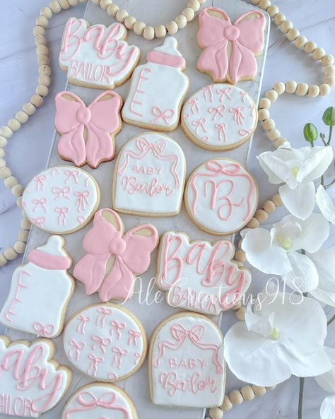 Baby Shower Cookies 🎀 Pricing? 👉🏻 https://msha.ke/alecreations918 • • • • #alecreations918 #tulsasmallbuisness #tulsaoklahoma #decoratedsugarcookies #customcookies #cookie #cookies #inspirationcookies #cookiesofinstagram #royalicingcookies #desserts #dessertporn #dessertideas #partyideas #party #sugarcookies #royalicing #royalicingcookies #cookies #cookiesideas #royalicingideas #bowbabyshower #babyshowercookies #firstbirthday #firstbirthdaycookies #firstbirthdayparty #firstbirthdayideas #fi... Vintage Pink Baby Shower Ideas, Bow Theme Baby Shower Ideas, Pink Bow Baby Shower Theme Decor, Sip And See Baby Shower Ideas, Pink Bow Cookies, Christmas Baby Shower Ideas For A Girl, Girl Baby Shower Ideas Pink, Girly Baby Shower Ideas, Bow Baby Shower Theme Girl