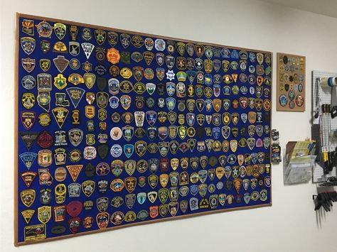 DIY patch board; cardboard, fabric, trim/molding, spray adhesive, finishing nails, staples. Police Patch Display Ideas, Police Patches Display, Patch Display, Badge Display, Patches Display, Diy Patch, Patch Collection, Collection Ideas, Trim Molding