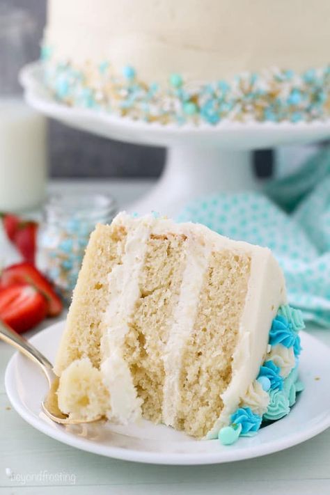 This Moist Vanilla Layer Cake is an easy oil-based vanilla cake recipe that is SUPER moist and spongy, you’ll know it’s a homemade vanilla cake. It’s decorated with the perfect vanilla frosting recipe. This is the BEST and only vanilla cake recipe you'll need. #layercake #vanillacake #cake #vanillafrosting #fromscratch Vanilla Cake Recipe Moist, Perfect Vanilla Cake Recipe, Cake Supply Store, Vanilla Layer Cake, Perfect Vanilla Cake, Easy Layer Cake, Vanilla Frosting Recipes, Best Vanilla Cake Recipe, Super Moist Chocolate Cake