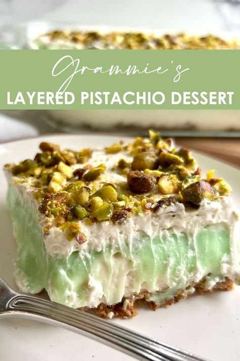 A piece of Grammie's Layered Pistachio Dessert on a white plate with fork and the serving dish of the dessert behind it 50s Desserts, Pistachio Recipes Desserts, Pistachio Dessert, Couples Dinner, Summer Bbq Recipes, Summer Cookout, Pistachio Pudding, Supper Ideas, Bbq Food