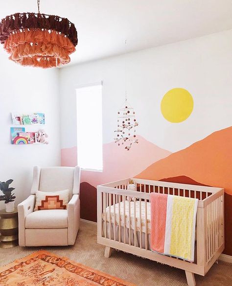 A brightly colored mural meets a gorgeous boho nursery. And we are loving every detail! Design: @stormybeaty Classy Nursery, Small Nursery, Adorable Nursery, Baby Room Design, Nursery Baby Room, Nursery Colors, Nursery Room Decor, Nursery Inspiration, Baby's Room