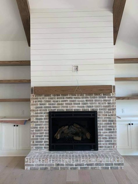 Brick Fireplace Floating Mantle, Shiplap Fireplace Brick, Brick Fireplace With Floating Mantle, Fireplace With Shiplap And Brick, Brick Fireplace Shiplap Wall, Brick Fireplace And Shiplap Wall, Floating Shelves Brick Fireplace, Half Brick Half Shiplap Fireplace, Brick Paneling Fireplace