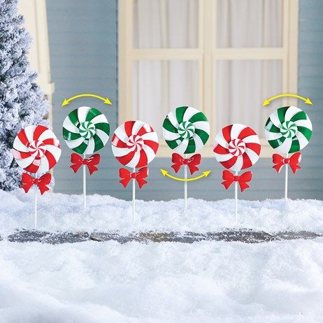 Red Bow Peppermint Wind Spinner Garden Stakes - Set of 6 | Collections Etc. Balloon Designs, Peppermint Candy Cane, Christmas Concert, Christmas Yard Decorations, Christmas Yard, Collections Etc, Holiday Store, Diy Holiday Decor, Peppermint Candy