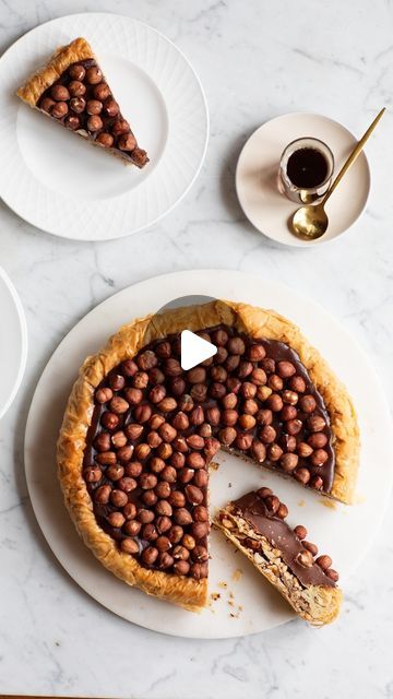 Antoniou Fillo Pastry on Instagram: "CHOC HAZELNUT BAKLAVA TART. Pure indulgence! A crispy hazelnut baklava base soaked in a brown sugar syrup and filled with a luscious chocolate hazelnut filling. Make it now or make it for Christmas – it’s a guaranteed crowd pleaser. Head to our website for the recipe, here is the link which you can copy into your internet browser (there is also a link in our Instagram bio): https://antonioufillo.com.au/blog/recipes/choc-hazelnut-baklava-tart #baklavatart #chocolatetart #hazelnuttart #nutellatart" Baklava Tart, Hazelnut Filling, Brown Sugar Syrup, Lebanese Cuisine, Sugar Syrup, Chocolate Tart, Crowd Pleaser, Chocolate Hazelnut, Instagram Bio