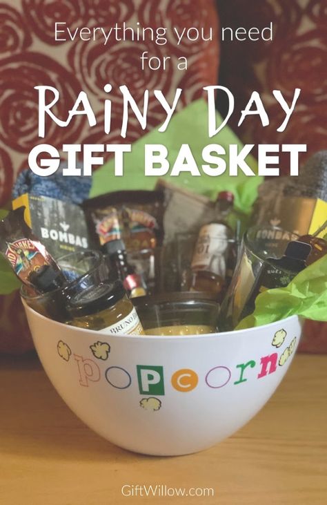 This rainy day gift basket is such a fun housewarming gift that can be used for birthdays, couples, christmas, or really any occasion! Rainy Day Gift Basket Ideas, Rainy Day Gift Basket, Bingo Gifts, Family Gift Baskets, Personalized Gift Baskets, Raffle Basket, Housewarming Gift Baskets, Personalised Gifts Diy, Raffle Baskets