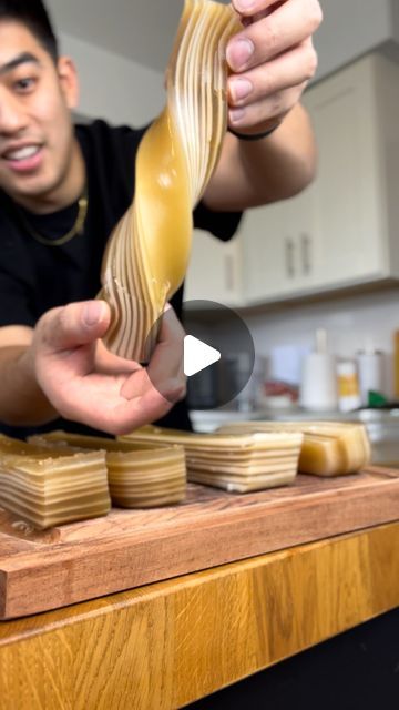 Tina & Brandon on Instagram: "Thousand layer cake RECIPE 👇🍰  The most satisfying part is peeling the cake layer by layer   Recipe:   Coconut layer - Melt ½ cup sugar in 2 cups water  - Mix 1 cup water chestnut flour with 2 cups coconut milk  - Pour one ladle of flour mixture into hot sugar water until thickens - Pour thickened mixture back into remaining milk and sieve   Brown sugar layer - Melt ½ cup of brown sugar in 2 cups water  - Mix 1 cup water chestnut flour with 2 cups water - Pour one ladle of flour mixture into hot sugar water until thickens - Pour thickened mixture back into remaining milk and sieve   Steam layer by layer on high heat (~3-5 minutes per layer until cooked)  Follow @magmagcooks for more easy Asian inspired recipes . . . #cny #easyrecipes #cooking #lny #foodie #c How To Make Steamed Milk, Layered Lotus Drink, Steamed Layer Cake, How To Steam Milk Without A Steamer, Steam Milk Without Steamer, Thousand Layer Cake, Malaysian Food Desserts, Homemade Crumpets, Water Chestnut