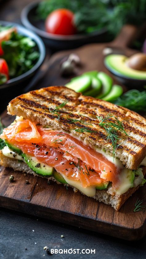 Satisfy your cravings with this Smoked Salmon Grilled Cheese! This recipe is a delicious and balanced meal, featuring carbs from the bread, creamy dairy from the cheese, healthy fats from avocado, and protein from salmon—all in one tasty sandwich. Save this easy grilled cheese recipe for your next quick meal! Check out the blog for 50+ ideas! Salmon Grilled Cheese, Fontina Grilled Cheese, Grilled Cheese Recipes Easy, Salmon Sandwich Recipes, Salmon Grilled, Grilled Cheese Sloppy Joe, Smoked Salmon Sandwich, Easy Grilled Cheese, Grilled Ham And Cheese