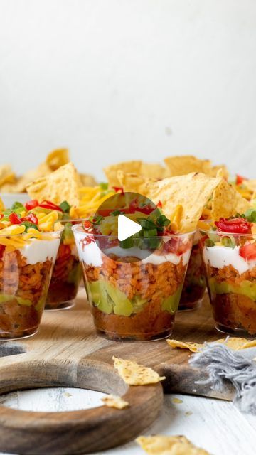 334K views · 22K likes | Tawnie Graham on Instagram: "@krolls_korner 7 LAYER BEAN DIP CUPS 😍🏈
.
Ultimate party appetizer and so easy to make! 💯👍🏼 I’ve rounded up all of the fan favorites Game Day Eats for you for the big game this weekend! Comment below “recipe please” and I’ll dm you the link to this recipe + more!💕
.
https://krollskorner.com/round-ups/game-day-eats-round-up/
.
#superbowl #superbowlsunday #superbowlfood #partyfood #easyappetizers #sevenlayerdip #sevenlayerbeandip #easyrecipeideas #gameday #gamedayfood #krollskorner" Bean Dip Cups, Seven Layer Bean Dip, Tawnie Graham, Layer Bean Dip, Krolls Korner, 7 Layer Bean Dip, Layered Bean Dip, Seven Layer Dip, Mexican Side Dishes